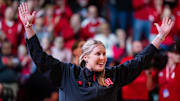 Nebraska Cornhuskers volleyball head coach Dani Busboom Kelly is introduced during a break in the first half against the Illinois Fighting Illini at Pinnacle Bank Arena.