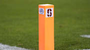 Oct 19, 2024; Stanford, California, USA; A goal line pylon displays the Stanford Cardinal and Atlantic Coast Conference logos during the fourth quarter against the Southern Methodist Mustangs at Stanford Stadium. Mandatory Credit: Darren Yamashita-Imagn Images