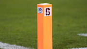 Oct 19, 2024; Stanford, California, USA; A goal line pylon displays the Stanford Cardinal and Atlantic Coast Conference logos during the fourth quarter against the Southern Methodist Mustangs at Stanford Stadium. Mandatory Credit: Darren Yamashita-Imagn Images