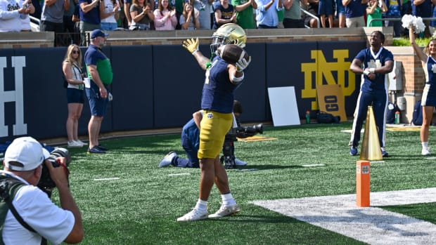 Chris Tyree celebrates a touchdown in the 2023 contest against Central Michigan