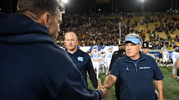 Oct 17, 2025; Berkeley, California, USA; California Golden Bears head coach Justin Wilcox and North Carolina Tar Heels head coach Bill Belichick shake hands after the game at California Memorial Stadium. 