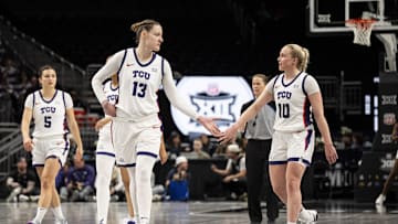 Mar 7, 2025; Kansas City, MO, USA; TCU Horned Frogs center Sedona Prince (13) and guard Hailey Van Lith (10) high five during the third quarter against the Colorado Buffaloes at T-Mobile Center. Mandatory Credit: Amy Kontras-Imagn Images