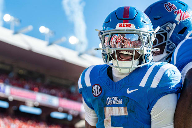 Ole Miss running back Kewan Lacy celebrates after scoring a touchdown against LSU.