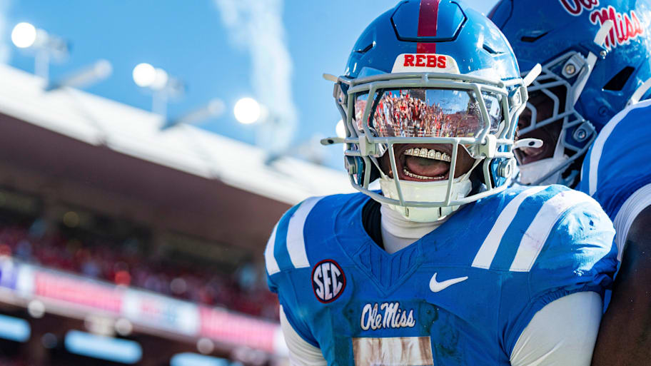 Ole Miss running back Kewan Lacy celebrates after scoring a touchdown against LSU.