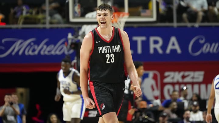 Jul 15, 2024; Las Vegas, NV, USA; Portland Trail Blazers center Donovan Clingan (23) reacts to a play against the Philadelphia 76ers during the second half at Thomas & Mack Center. Mandatory Credit: Lucas Peltier-USA TODAY Sports