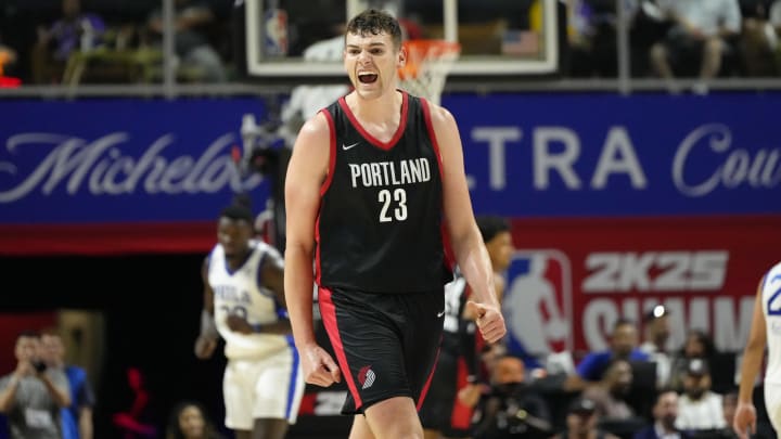 Jul 15, 2024; Las Vegas, NV, USA; Portland Trail Blazers center Donovan Clingan (23) reacts to a play against the Philadelphia 76ers during the second half at Thomas & Mack Center. Mandatory Credit: Lucas Peltier-USA TODAY Sports