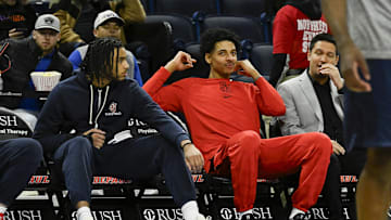 Feb 19, 2025; Chicago, Illinois, USA;  St. John's basketball guard Jaiden Glover (11) and St. John's Red Storm guard RJ Luis Jr. (12) sit on the bench during warmups before there game against DePaul Blue Demons at Wintrust Arena.