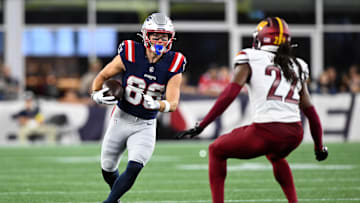 Aug 8, 2025; Foxborough, Massachusetts, USA; New England Patriots wide receiver Efton Chism III (86) runs against Washington Commanders cornerback Car'lin Vigers (22) during the second half at Gillette Stadium. Mandatory Credit: Brian Fluharty-Imagn Images