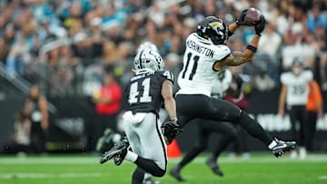 Nov 2, 2025; Paradise, Nevada, USA; Jacksonville Jaguars wide receiver Parker Washington (11) jumps up to make a catch during the first half against the Las Vegas Raiders at Allegiant Stadium. Mandatory Credit: Kirby Lee-Imagn Images