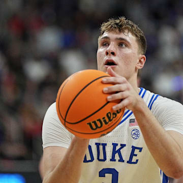 Mar 23, 2025; Raleigh, NC, USA; Duke Blue Devils forward Cooper Flagg (2) shoots the ball during the first half against the Baylor Bears in the second round of the NCAA Tournament at Lenovo Center. Mandatory Credit: Bob Donnan-Imagn Images