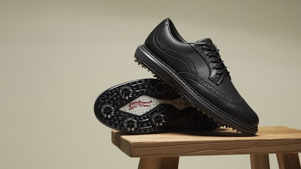Black golf shoes.