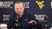 West Virginia Mountaineers head coach Darian DeVries answers questions from the media after defeating the UCF Knights at WVU Coliseum. 