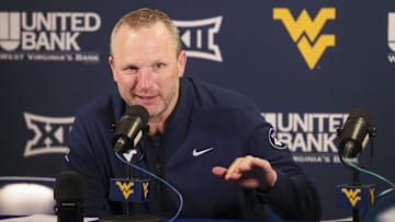 West Virginia Mountaineers head coach Darian DeVries answers questions from the media after defeating the UCF Knights at WVU Coliseum. 