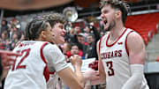 Feb 8, 2025; Pullman, Washington, USA; Washington State Cougars forward Ethan Price (3) celebrates with teammates after a game against the Pepperdine Waves at Friel Court at Beasley Coliseum. Washington State Cougars won 87-86. Mandatory Credit: James Snook-Imagn Images
