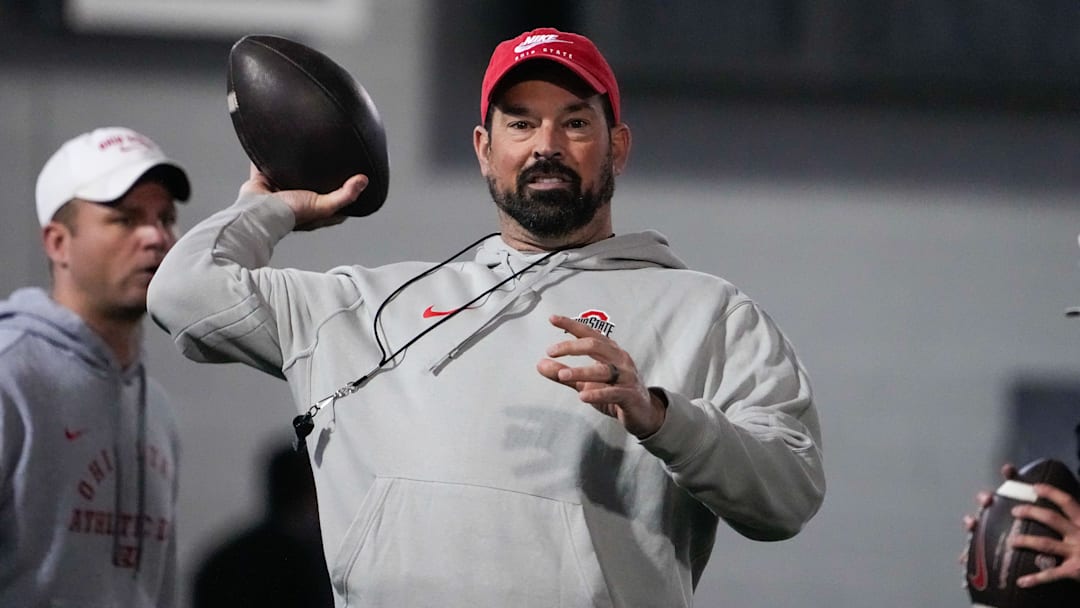 Ohio State Buckeyes head coach Ryan Day makes a pass during spring football practice at the Woody Hayes Athletic Center on Wednesday, March 19, 2025 in Columbus, Ohio.