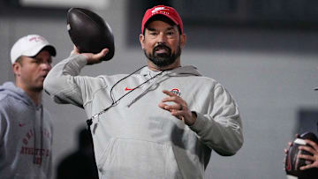 Ohio State Buckeyes head coach Ryan Day makes a pass during spring football practice at the Woody Hayes Athletic Center on Wednesday, March 19, 2025, in Columbus, Ohio.