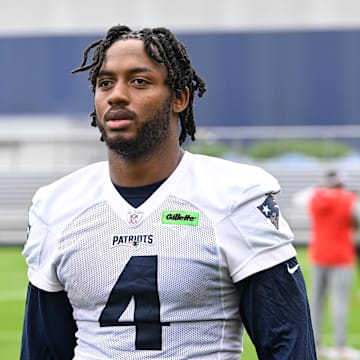 Jun 9, 2025; Foxborough, MA, USA; New England Patriots running back Antonio Gibson (4) leaves the practice fields after minicamp at Gillette Stadium. Mandatory Credit: Eric Canha-Imagn Images