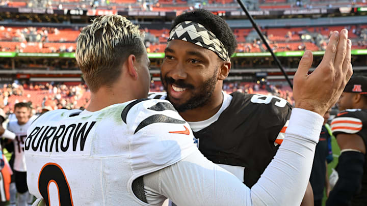 Cincinnati Bengals quarterback Joe Burrow with Cleveland Browns defensive end Myles Garrett