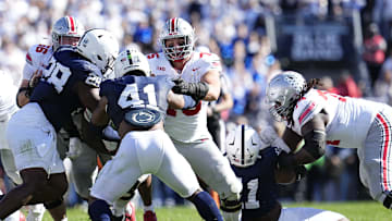 Ohio State Buckeyes offensive linemen Seth McLaughlin (56), Carson Hinzman (75) and Donovan Jackson (74) block during the NCAA football game against the Penn State Nittany Lions at Beaver Stadium in University Park, Pa. on Monday, Nov. 4, 2024. Ohio State won 20-13.