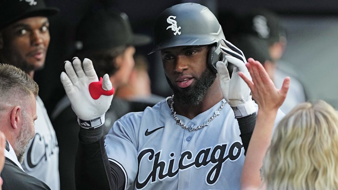 Jun 20, 2025; Toronto, Ontario, CAN; Chicago White Sox centre fielder Luis Robert Jr. (88) celebrates in the dugout after hitting a two run home run against the Toronto Blue Jays during the third inning at Rogers Centre. Mandatory Credit: Nick Turchiaro-Imagn Images