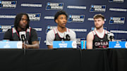 Mar 19, 2025; Providence, RI, USA; Omaha Mavericks guard JJ White (1) and Omaha Mavericks forward Marquel Sutton (10) and Omaha Mavericks guard Tony Osburn (32) answer questions during the First Round Practice Session  Press Conference at Amica Mutual Pavilion. Mandatory Credit: Gregory Fisher-Imagn Images