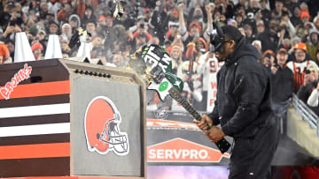 Dec 28, 2023; Cleveland, Ohio, USA; Cleveland Browns running back Nick Chubb (right) breaks guitar painted in New York Jets colors and logos before the game between the Browns and the Jets at Cleveland Browns Stadium. Mandatory Credit: Ken Blaze-USA TODAY Sports