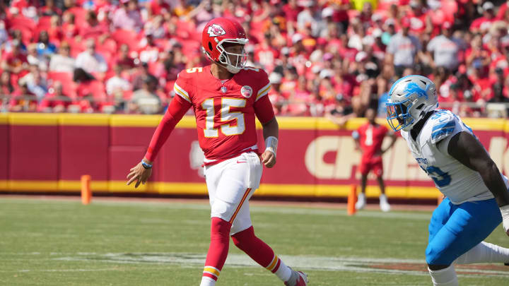 Aug 17, 2024; Kansas City, Missouri, USA; Kansas City Chiefs quarterback Patrick Mahomes (15) throws a behind-the-back underhand pass to tight end Travis Kelce (87) (not pictured) against the Detroit Lions during the first half at GEHA Field at Arrowhead Stadium. Mandatory Credit: Denny Medley-USA TODAY Sports