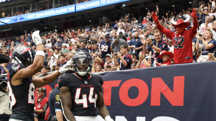 Aug 17, 2024; Houston, Texas, USA; Houston Texans wide receiver Johnny Johnson III (88) celebrates a touchdown by running back British Brooks (44) against the New York Giants in the fourth quarter at NRG Stadium. Mandatory Credit: Thomas Shea-USA TODAY Sports