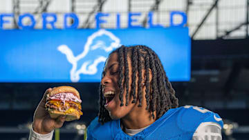 Jahmyr Gibbs with the All Roads Burger