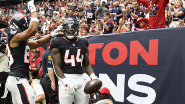 Aug 17, 2024; Houston, Texas, USA; Houston Texans wide receiver Johnny Johnson III (88) celebrates a touchdown by running back British Brooks (44) against the New York Giants in the fourth quarter at NRG Stadium. Mandatory Credit: Thomas Shea-USA TODAY Sports