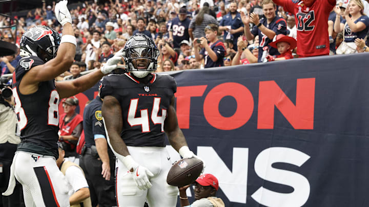 Aug 17, 2024; Houston, Texas, USA; Houston Texans wide receiver Johnny Johnson III (88) celebrates a touchdown by running back British Brooks (44) against the New York Giants in the fourth quarter at NRG Stadium. Mandatory Credit: Thomas Shea-USA TODAY Sports