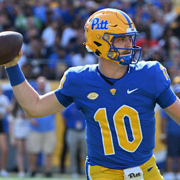 Sep 14, 2024; Pittsburgh, Pennsylvania, USA; Pittsburgh Panthers quarterback Eli Holstein (10) throws a pass against the West Virginia Mountaineers during the first quarter at Acrisure Stadium. 