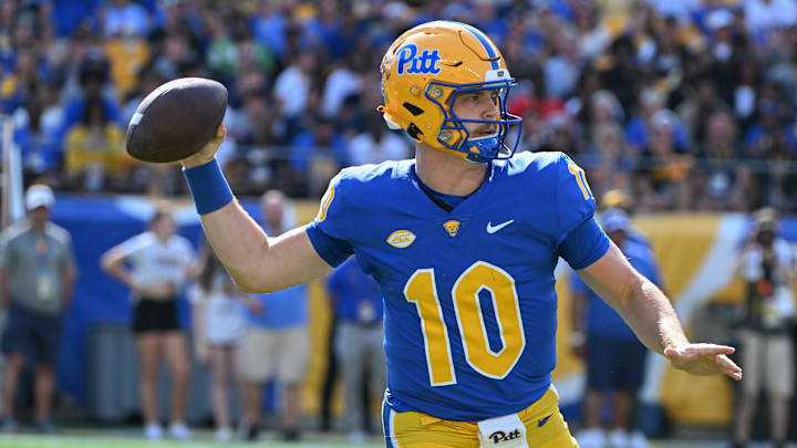 Sep 14, 2024; Pittsburgh, Pennsylvania, USA; Pittsburgh Panthers quarterback Eli Holstein (10) throws a pass against the West Virginia Mountaineers during the first quarter at Acrisure Stadium. 