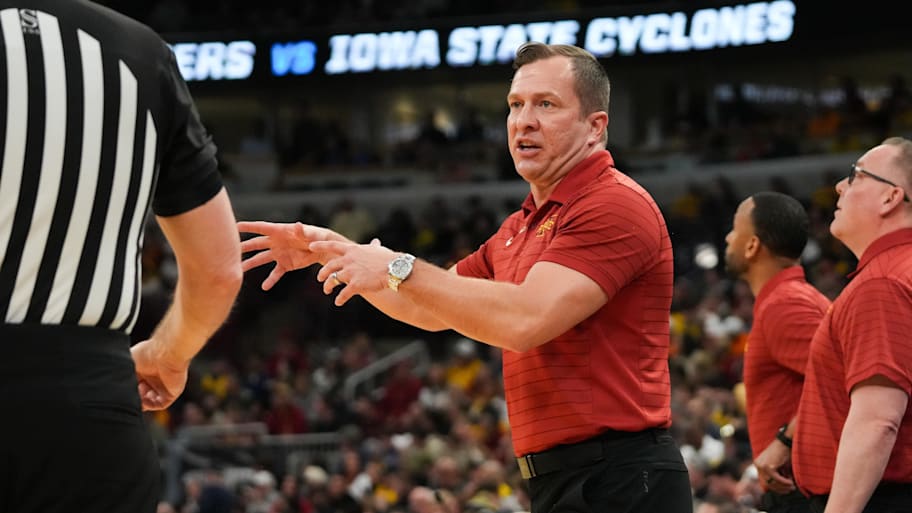 Iowa State Cyclones head coach T.J. Otzelberger speaks with the referee during the first half against Tennessee.
