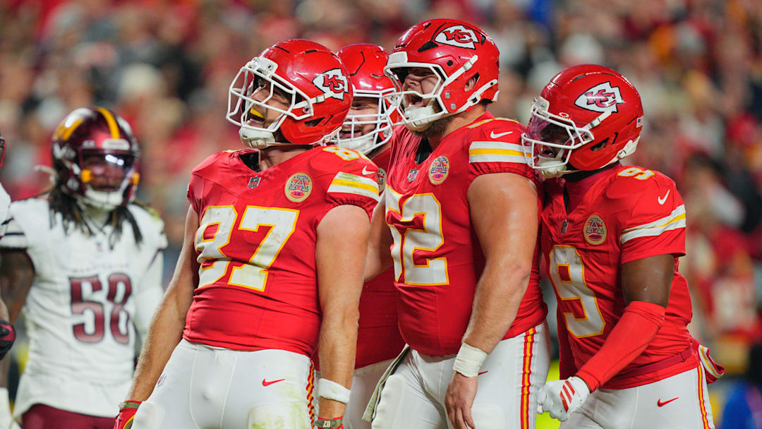 Oct 27, 2025; Kansas City, Missouri, USA; Kansas City Chiefs tight end Travis Kelce (87) celebrates after scoring a touchdown against the Washington Commanders during the third quarter of the game at GEHA Field at Arrowhead Stadium. Mandatory Credit: Jay Biggerstaff-Imagn Images