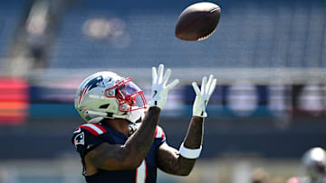 Sep 15, 2024; Foxborough, Massachusetts, USA; New England Patriots wide receiver Ja'Lynn Polk (1) catches the ball during warmups before a game against the Seattle Seahawks at Gillette Stadium. Mandatory Credit: Brian Fluharty-Imagn Images