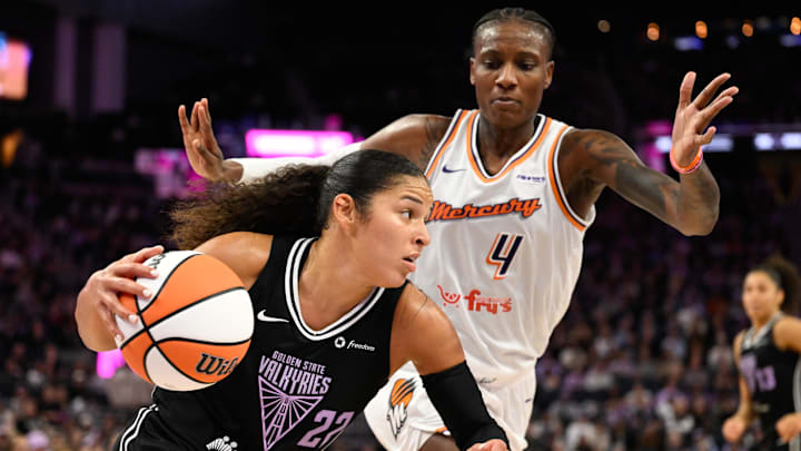 Aug 19, 2025; San Francisco, California, USA; Golden State Valkyries guard Veronica Burton (22) drives to the basket against Phoenix Mercury center Natasha Mack (4) in the fourth quarter at Chase Center. Mandatory Credit: Eakin Howard-Imagn Images