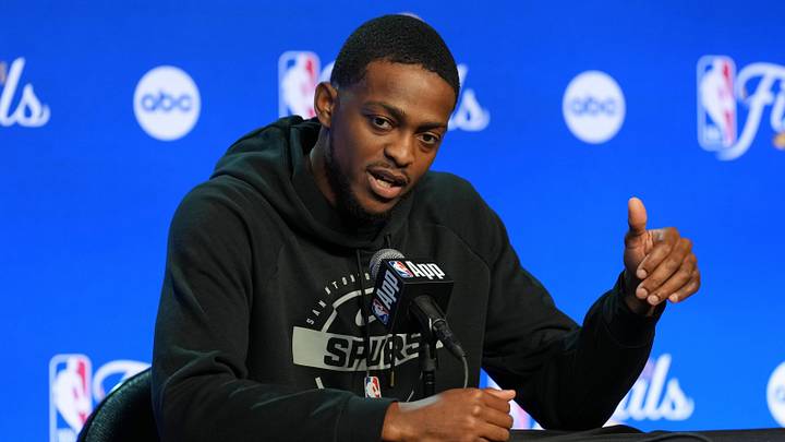 Jun 2, 2026; San Antonio, TX, USA;  San Antonio Spurs guard De'aaron Fox (4) talks to the press during media day for the 2026 NBA Finals at Frost Bank Center. Mandatory Credit: Daniel Dunn-Imagn Images