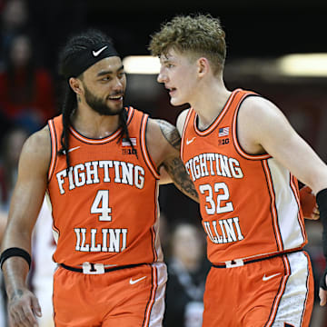 Jan 14, 2025; Bloomington, Indiana, USA; Illinois Fighting Illini guard Kylan Boswell (4) and Illinois Fighting Illini guard Kasparas Jakucionis (32) celebrate after a play during the first half against the Indiana Hoosiers at Simon Skjodt Assembly Hall. Mandatory Credit: Robert Goddin-Imagn Images