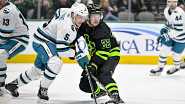 Nov 11, 2022; Dallas, Texas, USA; San Jose Sharks defenseman Matt Benning (5) defends against Dallas Stars right wing Matej Blumel (22) during the second period at American Airlines Center. Mandatory Credit: Jerome Miron-Imagn Images