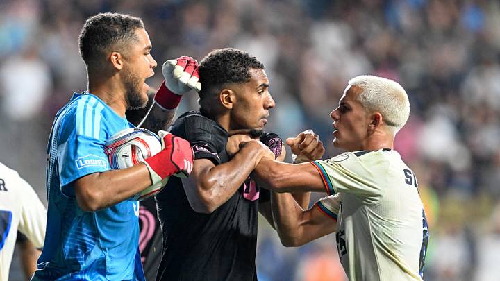 Inter Miami goalkeeper Dayne St. Clair, left, tries to stop a scuffle between teammate Yannick Bright and Philadelphia Union midfielder Cavan Sullivan after last night's match.