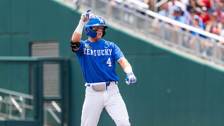 Jun 15, 2024; Omaha, NE, USA; Kentucky Wildcats second baseman Émilien Pitre (4) celebrates after hitting a double against the NC State Wolfpack during the first inning at Charles Schwab Filed Omaha. Mandatory Credit: Dylan Widger-Imagn Images