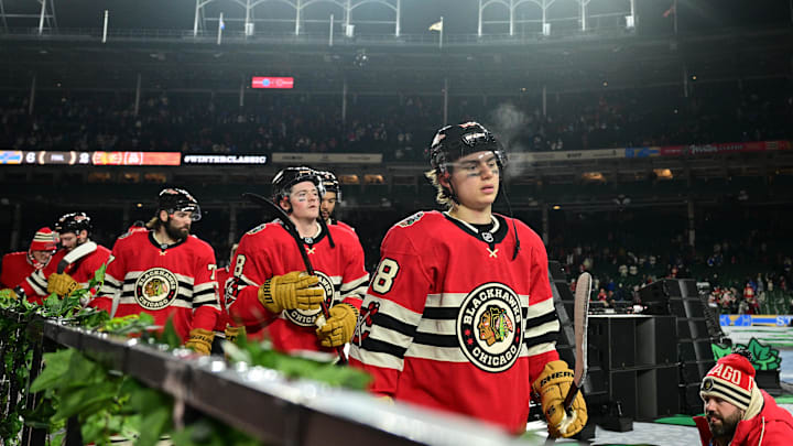 Dec 31, 2024; Chicago, Illinois, USA; Chicago Blackhawks center Connor Bedard (98) leaves the rink after the Winter Classic against the St. Louis Blues at Wrigley Field. Mandatory Credit: Daniel Bartel-Imagn Images