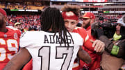 Dec 25, 2023; Kansas City, Missouri, USA; Kansas City Chiefs quarterback Patrick Mahomes (15) embraces Las Vegas Raiders wide receiver Davante Adams (17) after the game at GEHA Field at Arrowhead Stadium. Mandatory Credit: Denny Medley-USA TODAY Sports