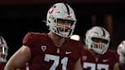 Nov 5, 2021; Stanford, California, USA;  Stanford Cardinal offensive tackle Connor McLaughlin (71) walks out of the tunnel with his teammates for warmups against the Utah Utes at Stanford Stadium. Mandatory Credit: Stan Szeto-Imagn Images
