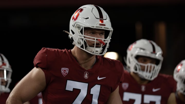 Nov 5, 2021; Stanford, California, USA;  Stanford Cardinal offensive tackle Connor McLaughlin (71) walks out of the tunnel with his teammates for warmups against the Utah Utes at Stanford Stadium. Mandatory Credit: Stan Szeto-USA TODAY Sports