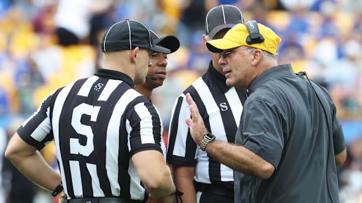 Sep 6, 2025; Pittsburgh, Pennsylvania, USA; Pittsburgh Panthers head coach Pat Narduzzi (right) talks to officials against the Central Michigan Chippewas during the second quarter at Acrisure Stadium. Mandatory Credit: Charles LeClaire-Imagn Images Sep 6, 2025; Pittsburgh, Pennsylvania, USA; Pittsburgh Panthers head coach Pat Narduzzi (right) talks to officials against the Central Michigan Chippewas during the second quarter at Acrisure Stadium. Mandatory Credit: Charles LeClaire-Imagn Images