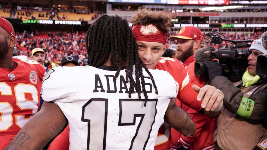 Dec 25, 2023; Kansas City, Missouri, USA; Kansas City Chiefs quarterback Patrick Mahomes (15) embraces Las Vegas Raiders wide receiver Davante Adams (17) after the game at GEHA Field at Arrowhead Stadium. Mandatory Credit: Denny Medley-USA TODAY Sports | Denny Medley-USA TODAY Sports