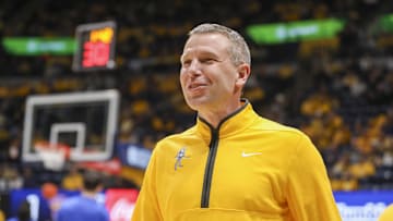 Nov 13, 2025; Morgantown, West Virginia, USA; West Virginia Mountaineers head coach Ross Hodge smiles during pregame introductions before their game against the Pittsburgh Panthers at WVU Coliseum. Mandatory Credit: Ben Queen-Imagn Images