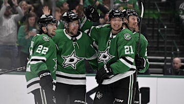 Mar 4, 2025; Dallas, Texas, USA;Dallas Stars center Mavrik Bourque (22) and defenseman Ilya Lyubushkin (46) and left wing Jason Robertson (21) and center Roope Hintz (24) celebrate a goal during the game between the Dallas Stars and the New Jersey Devils at the American Airlines Center.